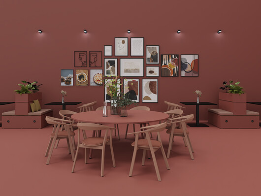 WINEA TEAMS Tisch mit runder Tischplatte und Gestell in Rostrot.